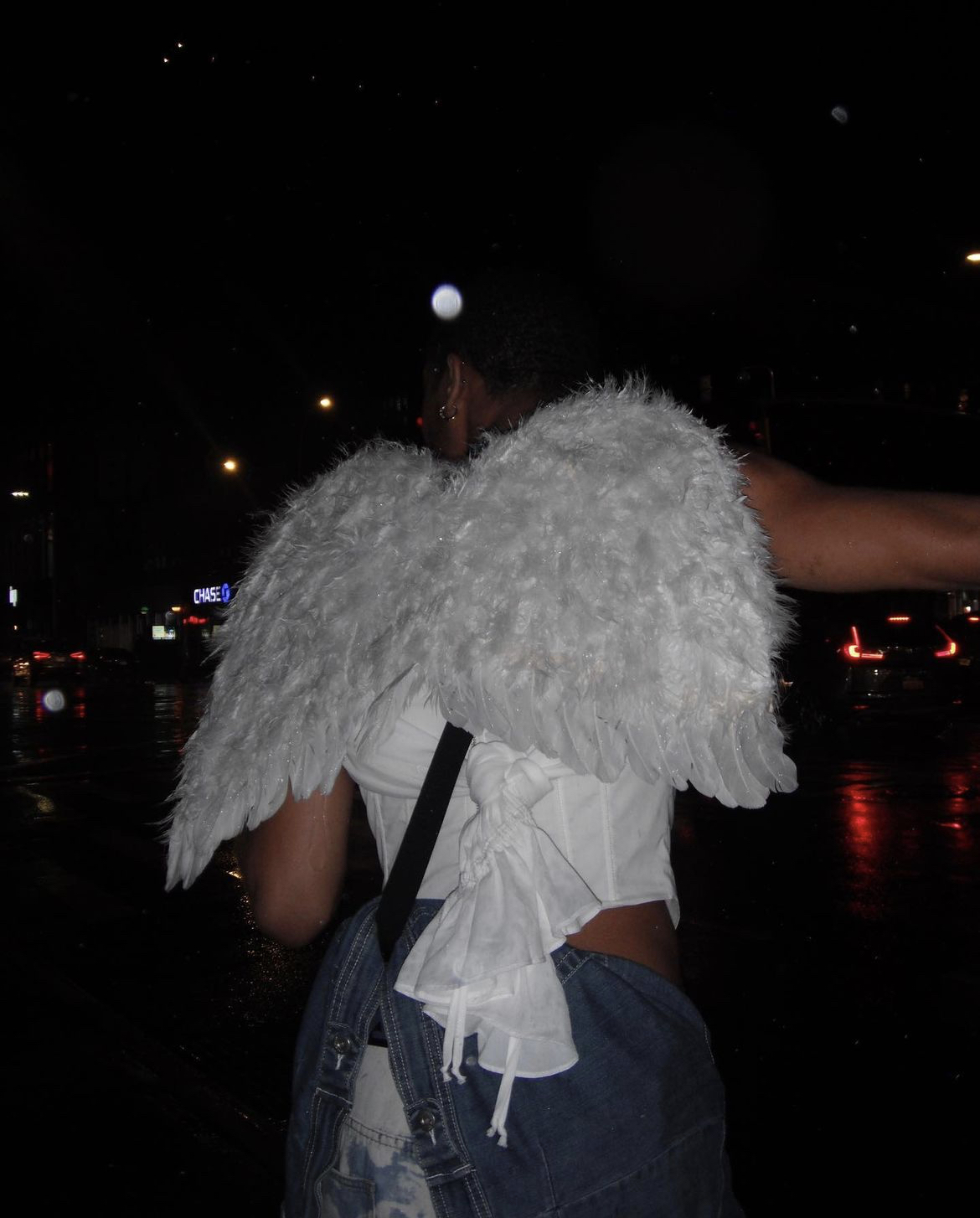 Wrenn in an angel wings costume