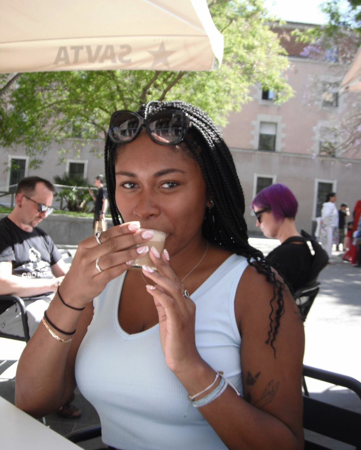 Camille sipping an espresso martini