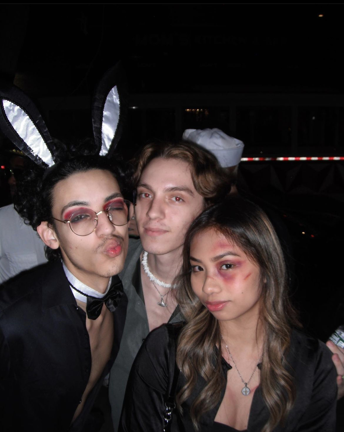 Ami, Michael, and Gabbie posing in their Halloween costumes